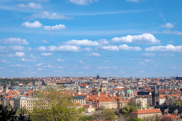 Naklejka na ściany i meble Prague cityscape - shot taken from Prague castle overlooking part of Charles Bridge and Old Town and New Town