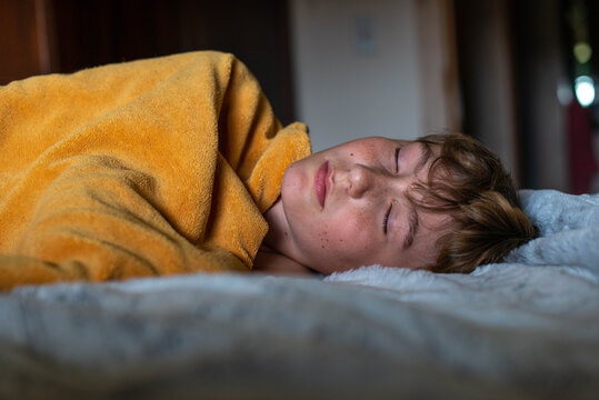Boy Lazing in Bed