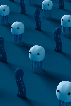 Blue jellyfishes and seaweed on blue background