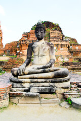 Buddha statue and archaeological site in Ancient archaeological site at Ayutthaya., Historical Park of Thailand.