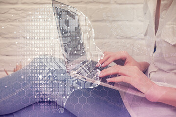 Multi exposure of woman hands working on computer and brain hologram drawing. Ai concept.