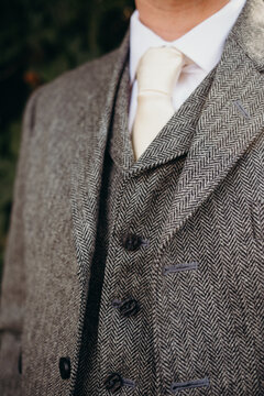 Closeup of Groom's Suit, Vest, and Tie