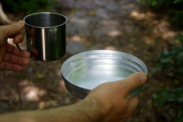 Empty bowl in hand as concept of global famine and hunger crisis