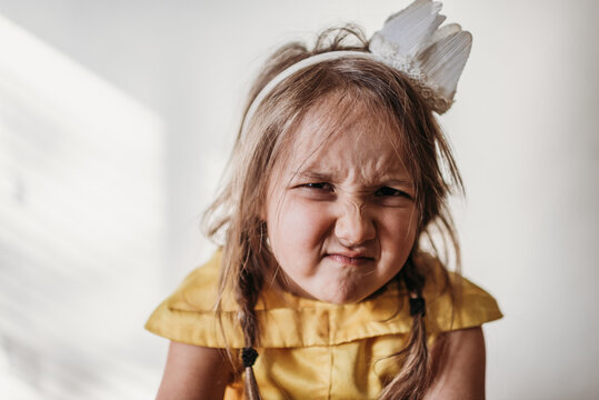Lifestyle portrait of young girl dresssed up
