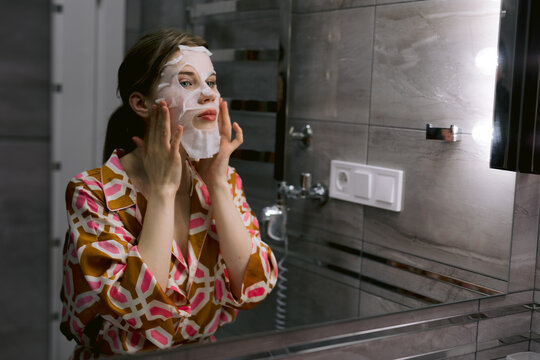 Woman caring about her problem skin 
