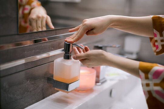 Girl observing hands hygiene 