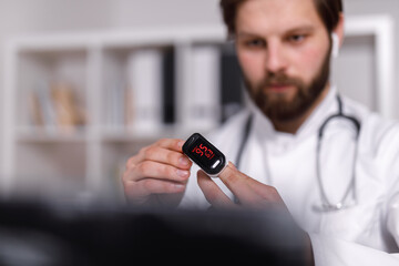 Doctor measuring heart pressure 