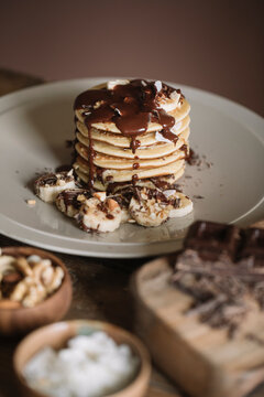 Still Life Of Homemade Organic Pancakes With Chocolate And Banana