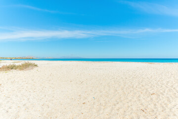 Fototapeta na wymiar White sand in Le Saline beach in Stintino