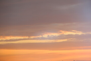 Pink-orange sunrise in the summer sky. Backgrounds