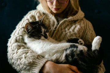 young girl holding her cat
