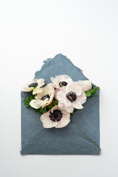 Flowers coming out of envelope