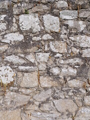 A close-up on a stone wall at Batz-sur-mer. June 2021, France.