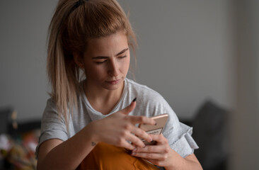 Stylish woman using cell phone