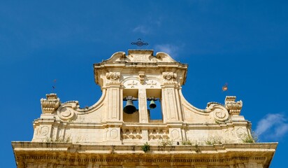 Naklejka premium Noto, Sicily. Top section of Chiesa di San Giovanni Battista alle Anime Sante, built in the first half of the 18th century.