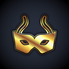 Gold Festive mask icon isolated on black background. Merry Christmas and Happy New Year. Vector