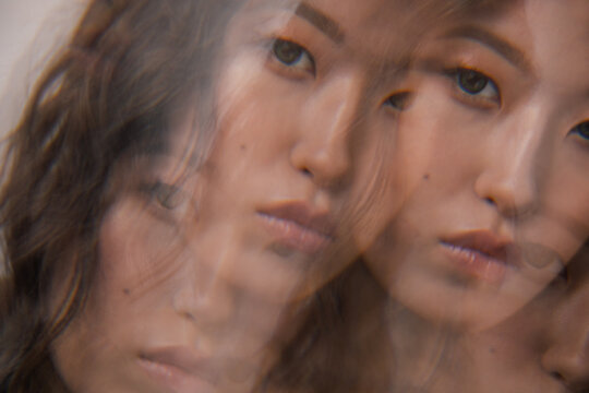 Multi exposure asian woman 