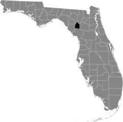 Black highlighted location map of the US Gilchrist county inside gray map of the Federal State of Florida, USA