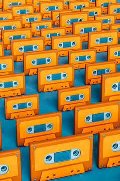 a lot of Orange musicassette on blue background