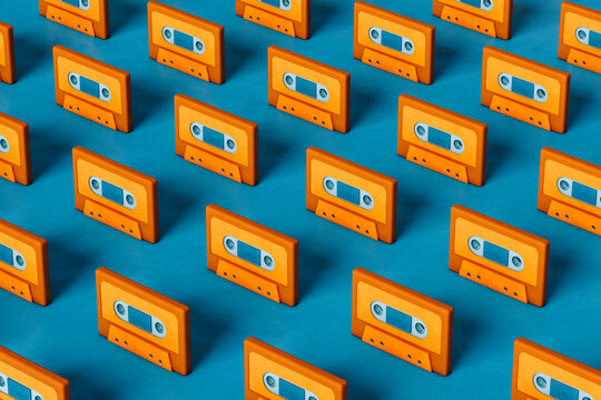 Orange musicassette on blue background