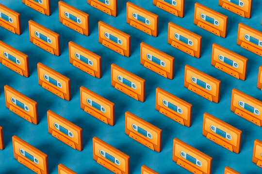 pattern of Orange musicassette on blue background - horizontal image