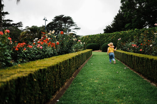 toddler running through park
