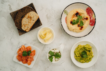 Tapas hummus, salmon, cottage cheese, smashed avocado and bread