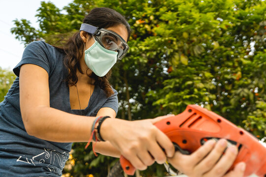 woman working with a drill