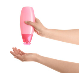 Woman holding bottle of shower gel on white background, closeup. Mockup for design