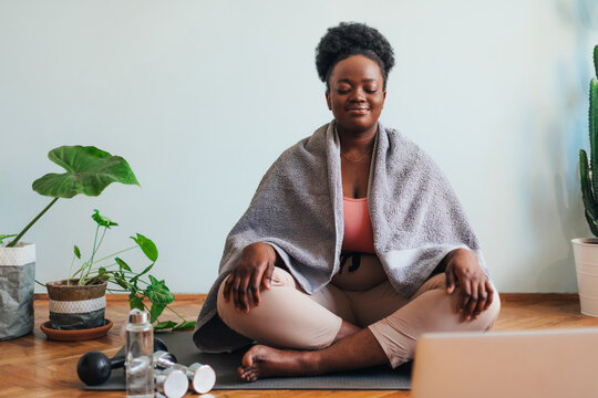 Woman Meditating in the Studio