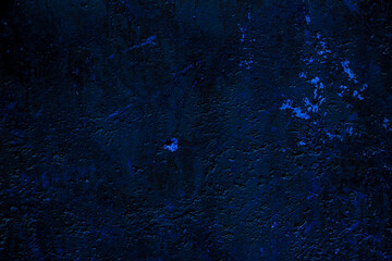 Blue colored abstract wall background with textures of different shades of blue