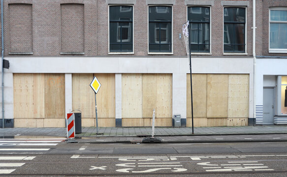 boarded up store window
