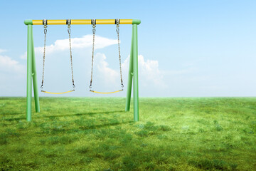 Swing hanging on an iron pillar on the playground