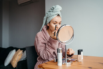 Woman using cosmetics