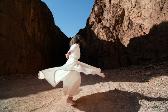 Sufi dance inside canyon 