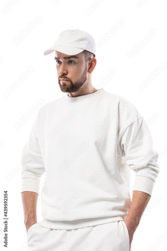 Wall mural Handsome man wearing blank white cap on white background