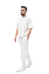 Handsome man wearing white clothes with a blank space for design on white background