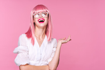 happy woman wearing glasses pink hair gesturing with hands Copy Space