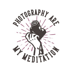 Obraz premium t-shirt design slogan typography photography are my meditation with hand holding a camera vintage illustration