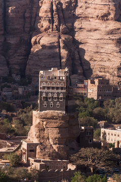 standing on a rock dar al-hajar palace in Yemen