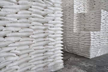 Large heaps of loaded bags at storage