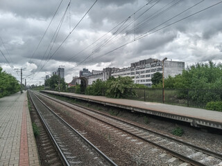 Fototapeta premium Empty railway platform in the old soviet industrial zone.