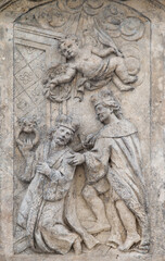 Fototapeta na wymiar Relief of the assassination of Saint Wenceslas, the main patron saint of the Czech nation. Kutna Hora, Czech Republic.