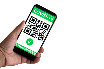 Man holding a smartphone to show app vaccine passport vaccination against coronavirus or COVID-19....