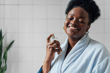 Woman Applying Perfume 