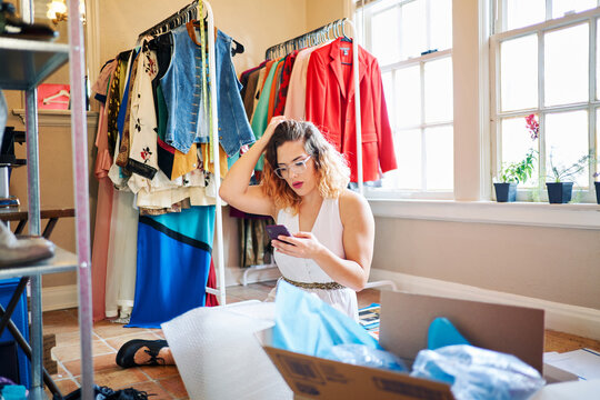 Young startup entrepreneur  working at home, packaging and delivery situation.