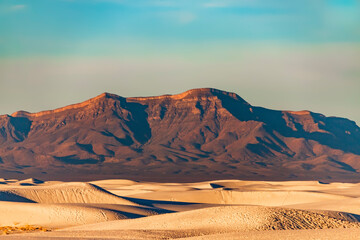Fototapeta na wymiar dramatic desert landscape of white sand dunes in New Mexico