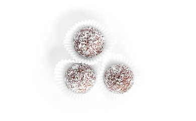 Chocolate candy truffles with coconut isolated on a white background.
