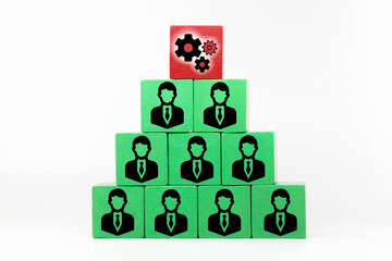 colored cubes with workers and placed system in the topmost work
