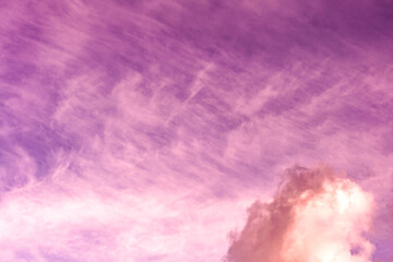 Artistic photo of toned pink sky with clouds, abstract background